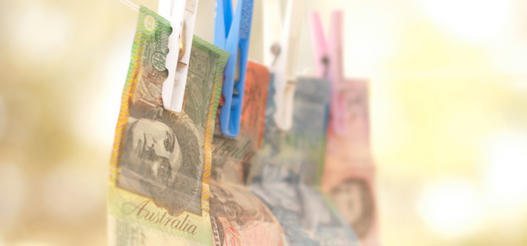 Australian money hanging on a line